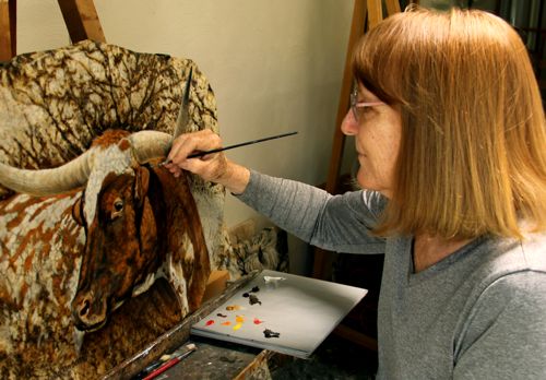 susan painting cow 500x348